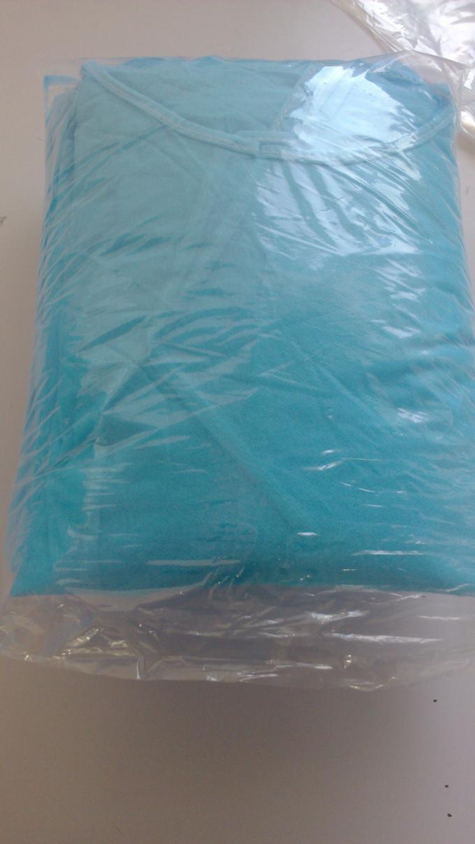 Elastico/ha tricottato l'abito medico delle tute eliminabili della sicurezza del polsino con il collare e le tasche di V