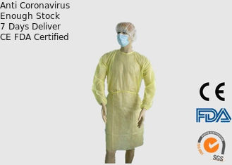 Grandi indumenti medici eliminabili, abiti di isolamento di giallo dell'esame di sicurezza